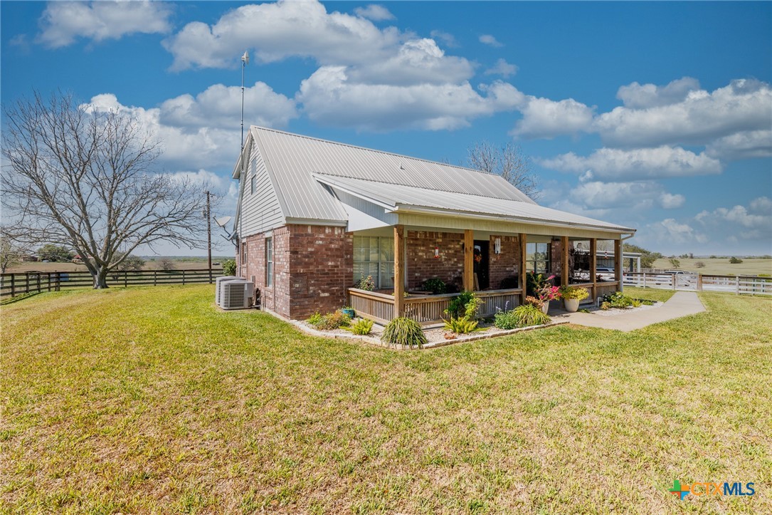 2110 Immenhauser Road Yoakum, TX 77995 - Photo 4 of 39 a view of a house with swimming pool and sitting area