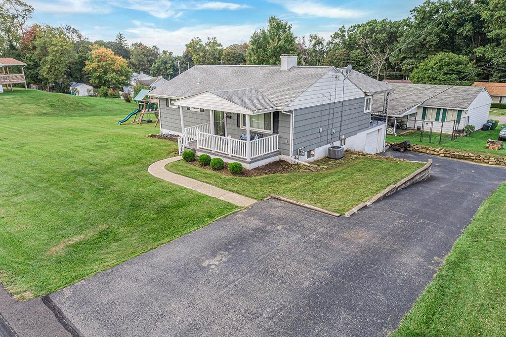 110 Maple Drive Beaver, PA 15009 - Photo 20 of 23 a aerial view of a house with a yard table and chairs