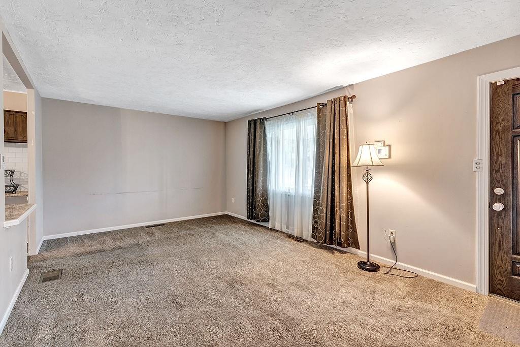 110 Maple Drive Beaver, PA 15009 - Photo 4 of 23 an empty room with closet and mirror