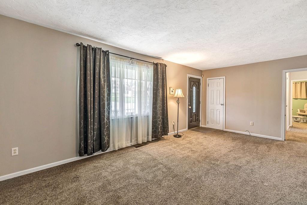 110 Maple Drive Beaver, PA 15009 - Photo 5 of 23 an empty room with windows
