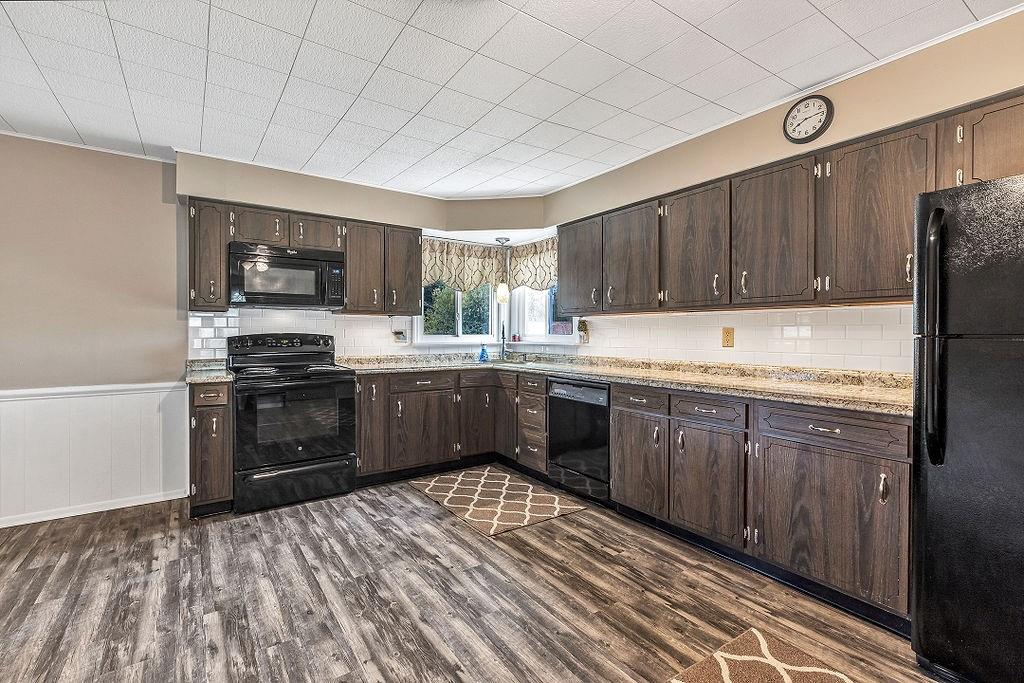 110 Maple Drive Beaver, PA 15009 - Photo 6 of 23 a kitchen with stainless steel appliances granite countertop a refrigerator sink and cabinets