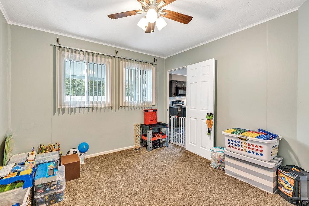 110 Maple Drive Beaver, PA 15009 - Photo 9 of 23 a bedroom with furniture and a window