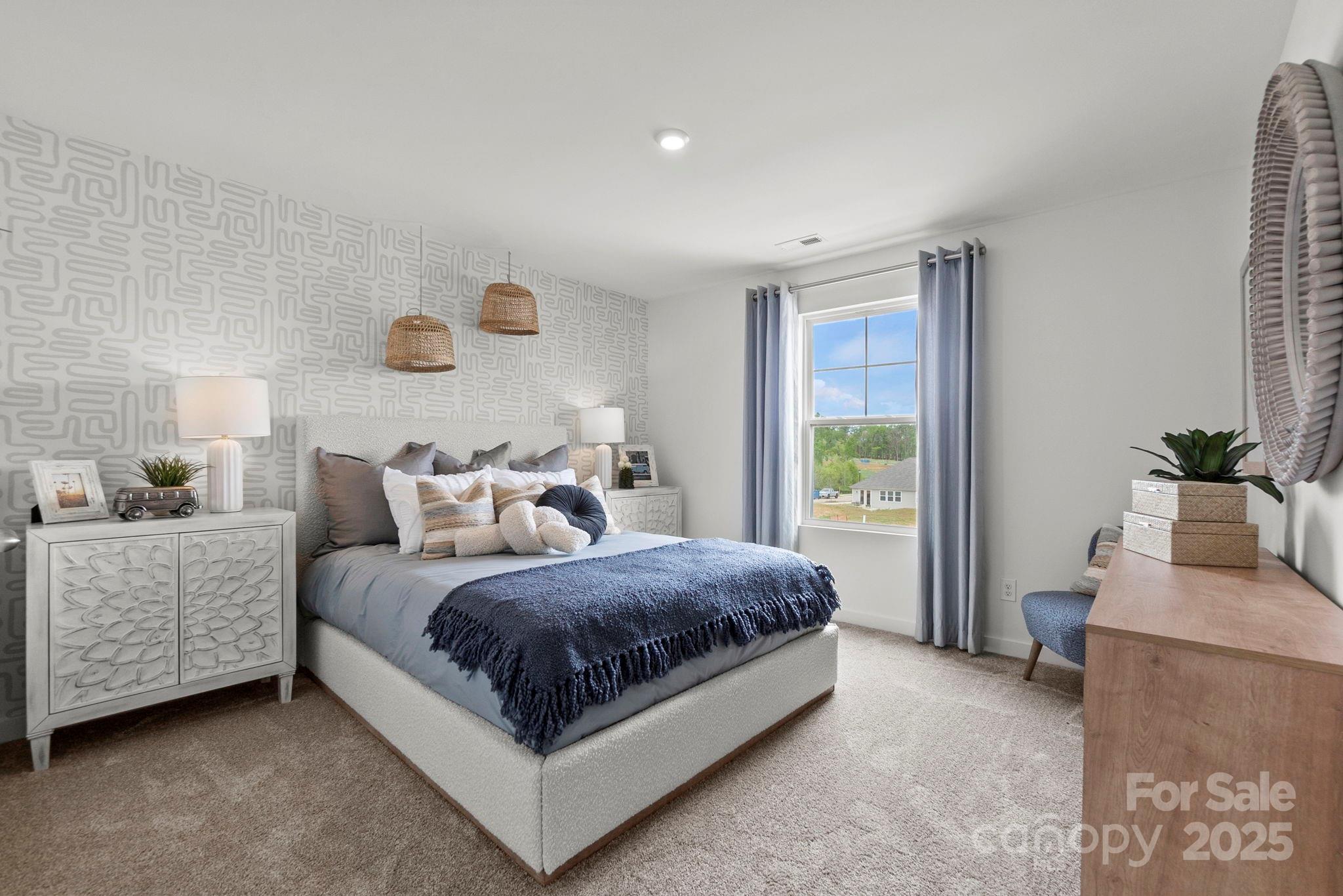2573 Blue Sky Mdws Drive Monroe, NC 28110 - Photo 22 of 45 a living room with a bed furniture and a window