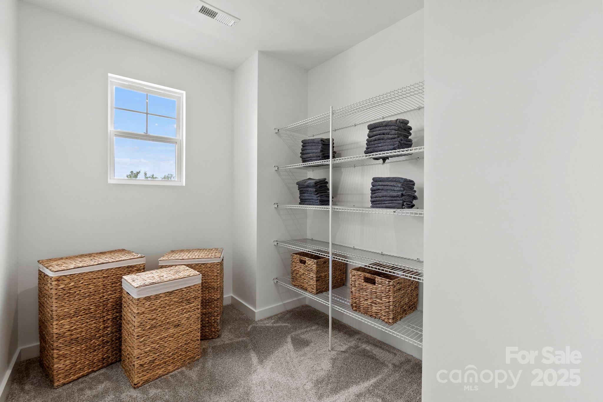 2573 Blue Sky Mdws Drive Monroe, NC 28110 - Photo 23 of 45 a room with furniture a rug and white wall