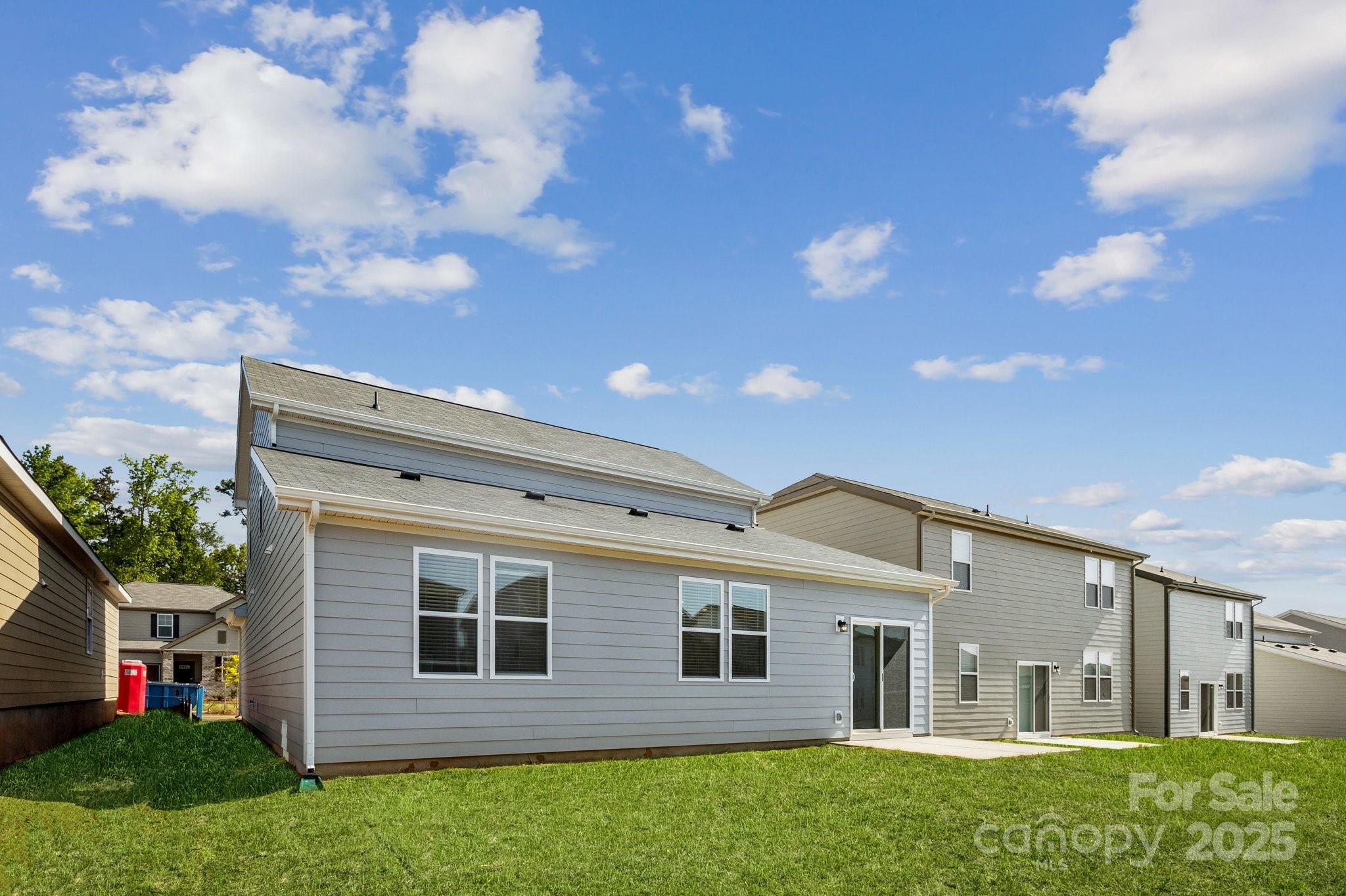 2573 Blue Sky Mdws Drive Monroe, NC 28110 - Photo 39 of 45 a view of a back yard of the house