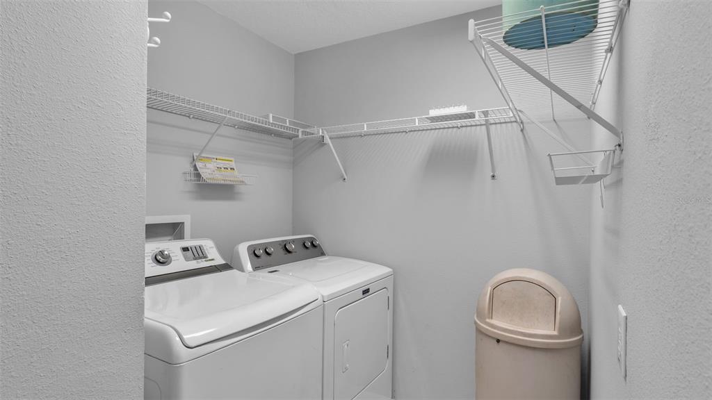 2729 Pankaw Lane Valrico, FL 33596 - Photo 28 of 41 a utility room with dryer and washer