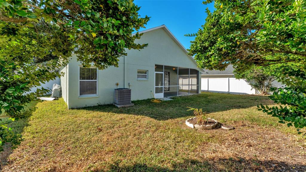 2729 Pankaw Lane Valrico, FL 33596 - Photo 33 of 41 a view of a house with backyard and garden