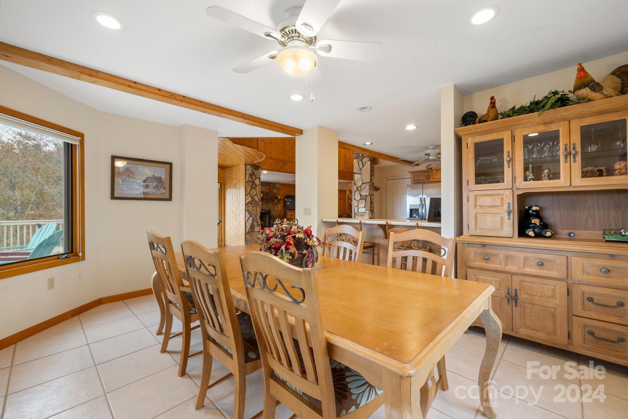 425 Turkey Run Bryson City, NC 28713 - Photo 13 of 47 a view of a dining room with furniture and chandelier