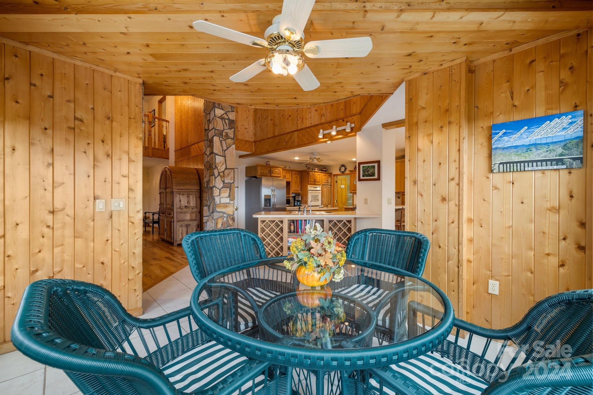 425 Turkey Run Bryson City, NC 28713 - Photo 19 of 47 a balcony with furniture and wooden floor