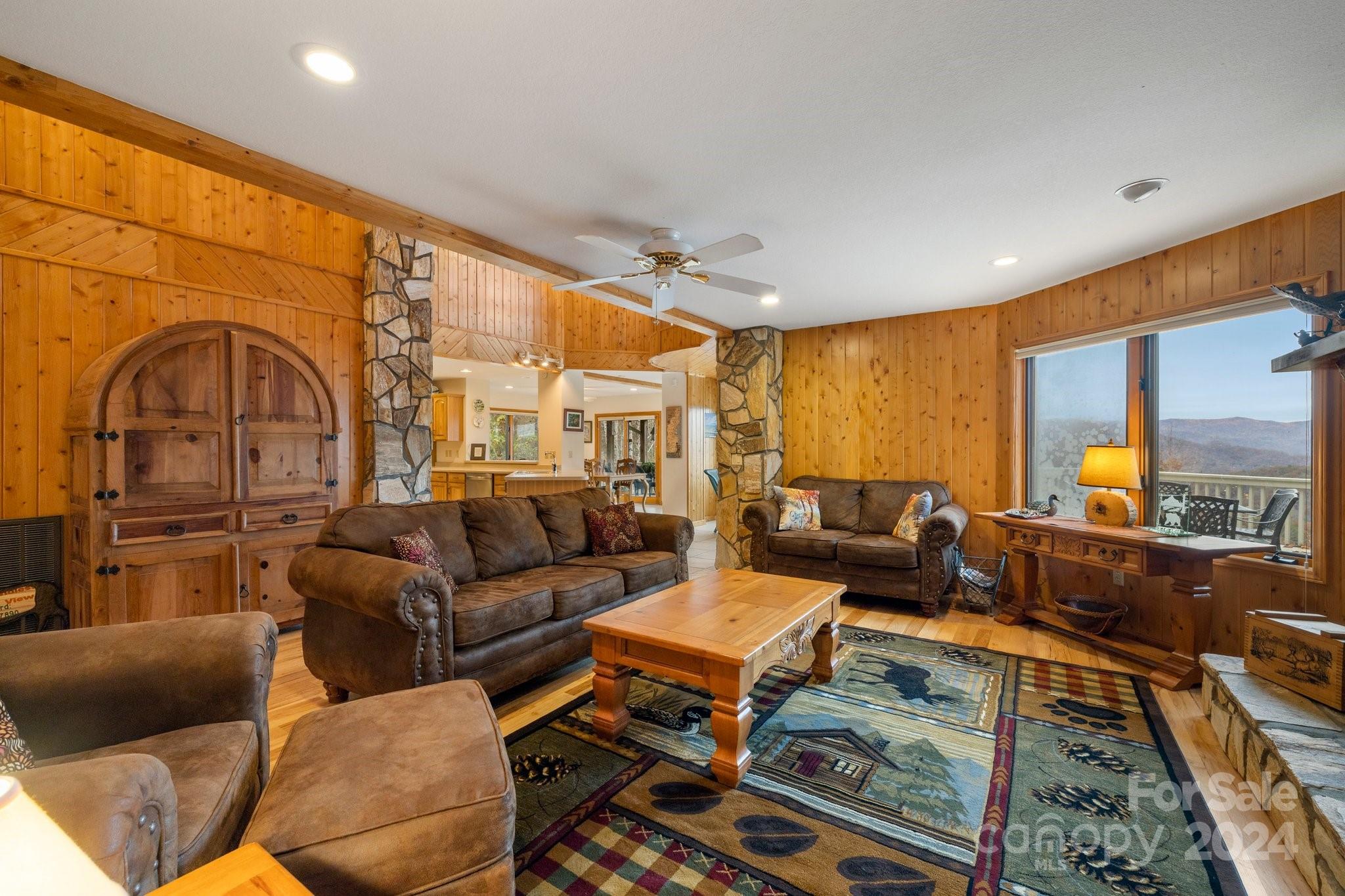425 Turkey Run Bryson City, NC 28713 - Photo 24 of 47 a living room with furniture and a large window