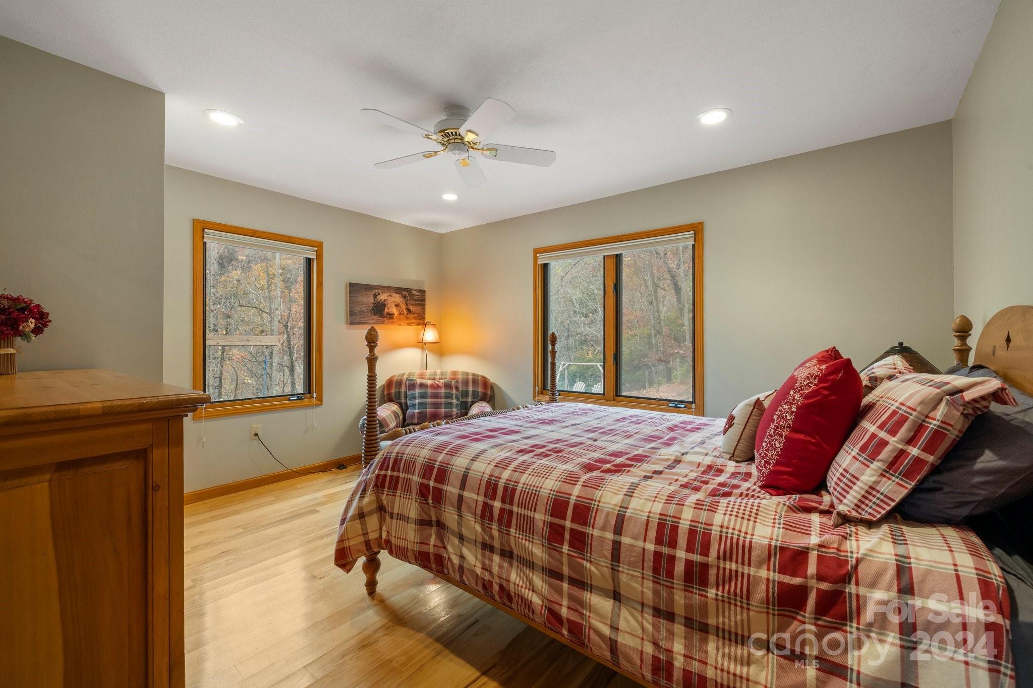 425 Turkey Run Bryson City, NC 28713 - Photo 27 of 47 a bedroom with a large bed and a window