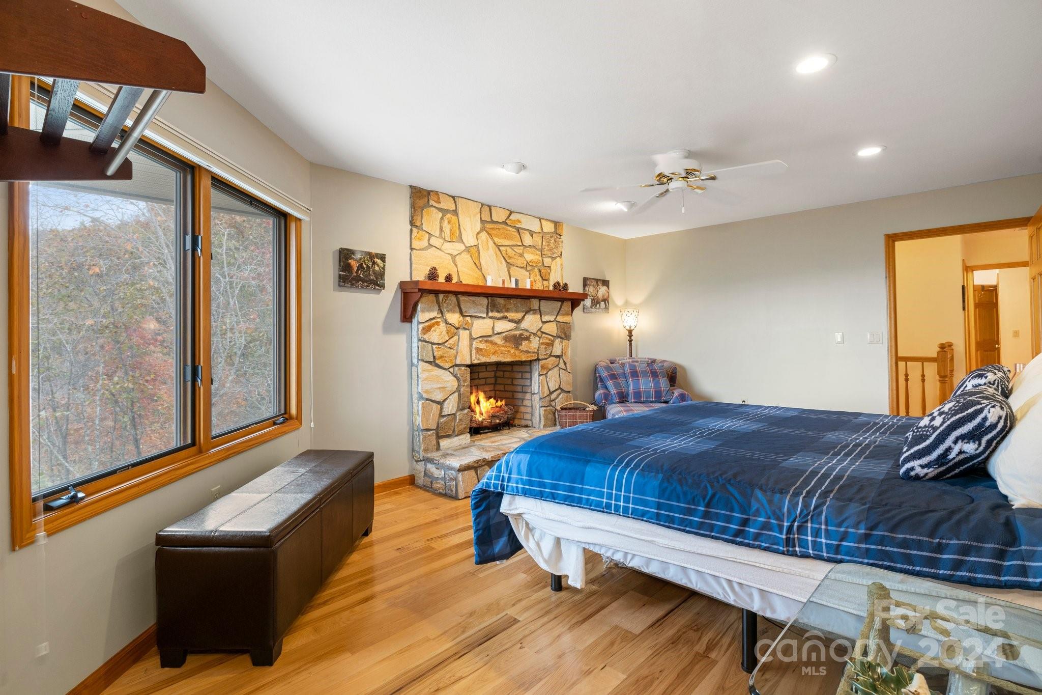 425 Turkey Run Bryson City, NC 28713 - Photo 32 of 47 a bedroom with a bed and window