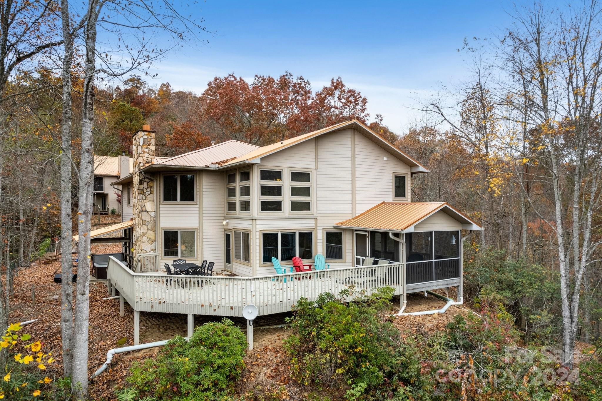 425 Turkey Run Bryson City, NC 28713 - Photo 46 of 47 a front view of a house with a yard and balcony