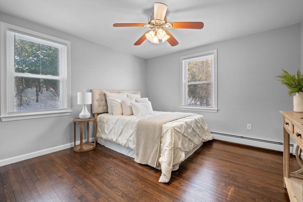 98 West Street Georgetown, MA 01833 - Photo 17 of 39 a bedroom with a bed and a window