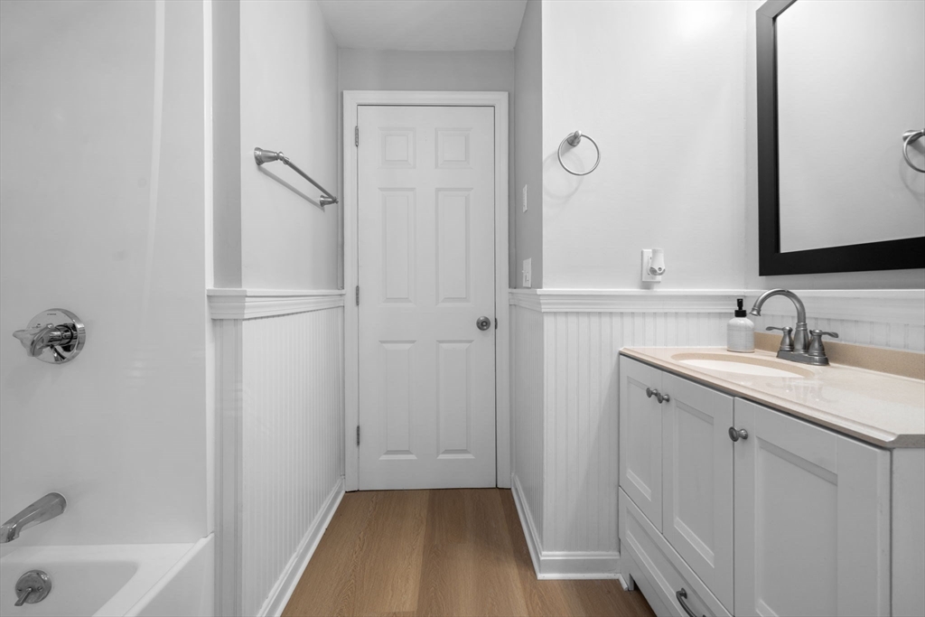 98 West Street Georgetown, MA 01833 - Photo 18 of 39 a bathroom with a sink and a mirror