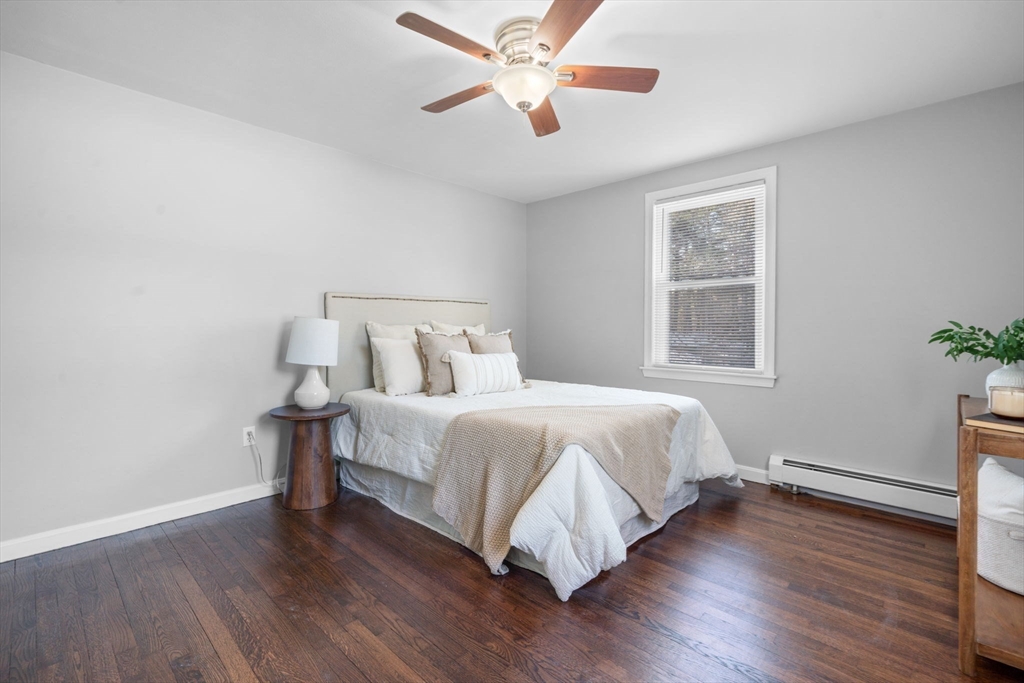 98 West Street Georgetown, MA 01833 - Photo 21 of 39 a bedroom with a bed and a window