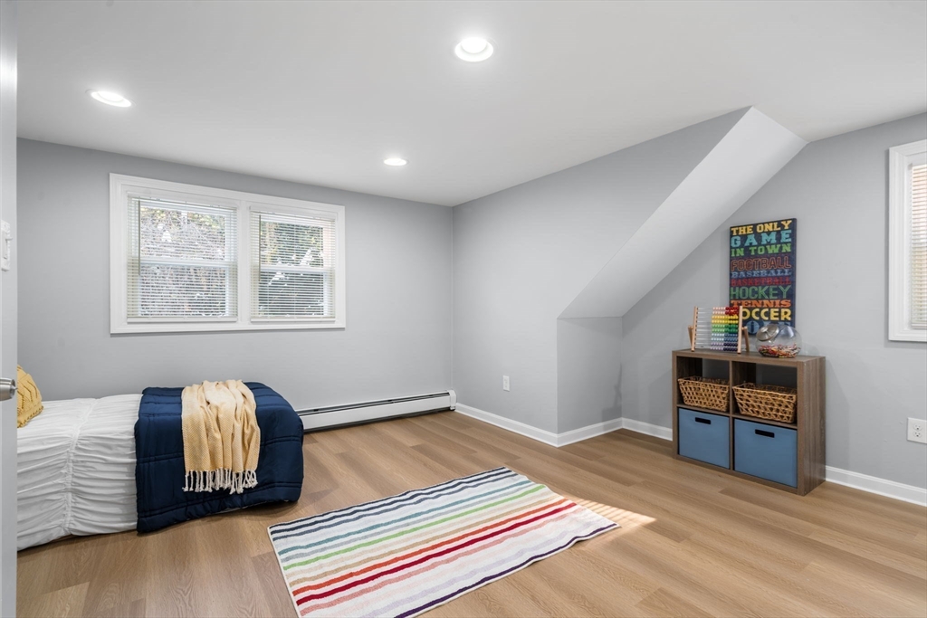 98 West Street Georgetown, MA 01833 - Photo 34 of 39 a bedroom with furniture and a window