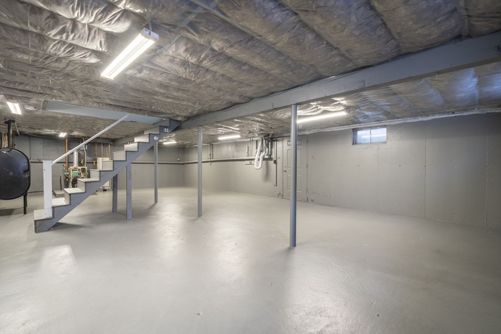 98 West Street Georgetown, MA 01833 - Photo 35 of 39 a view of a room with wooden floor