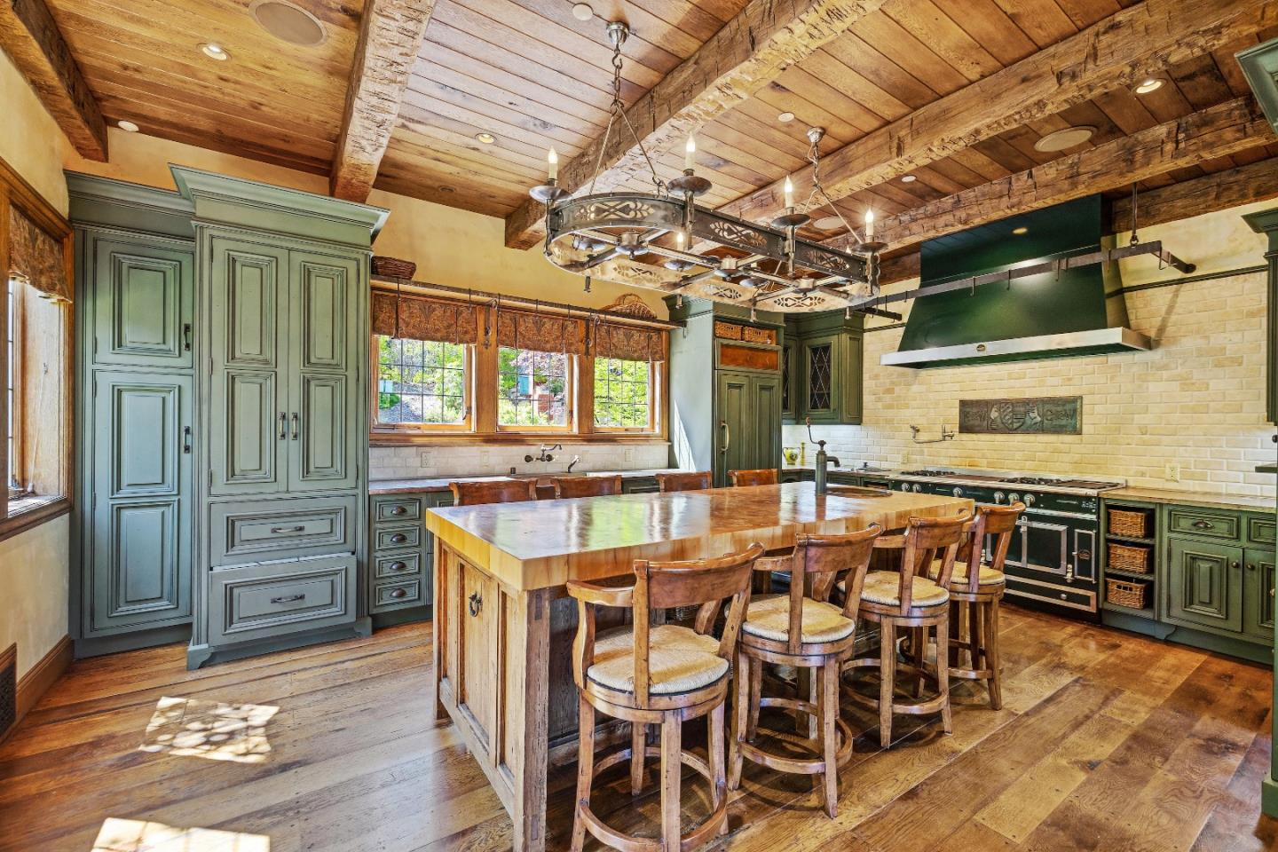 446 El Arroyo Road Hillsborough, CA 94010 - Photo 12 of 32 a view of a dining room with furniture window and wooden floor