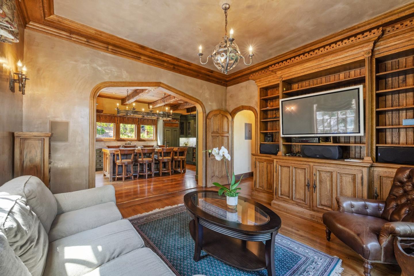 446 El Arroyo Road Hillsborough, CA 94010 - Photo 14 of 32 a living room with furniture and a chandelier