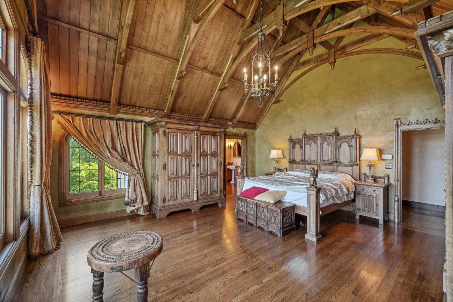 446 El Arroyo Road Hillsborough, CA 94010 - Photo 17 of 32 a bedroom with a bed and a window