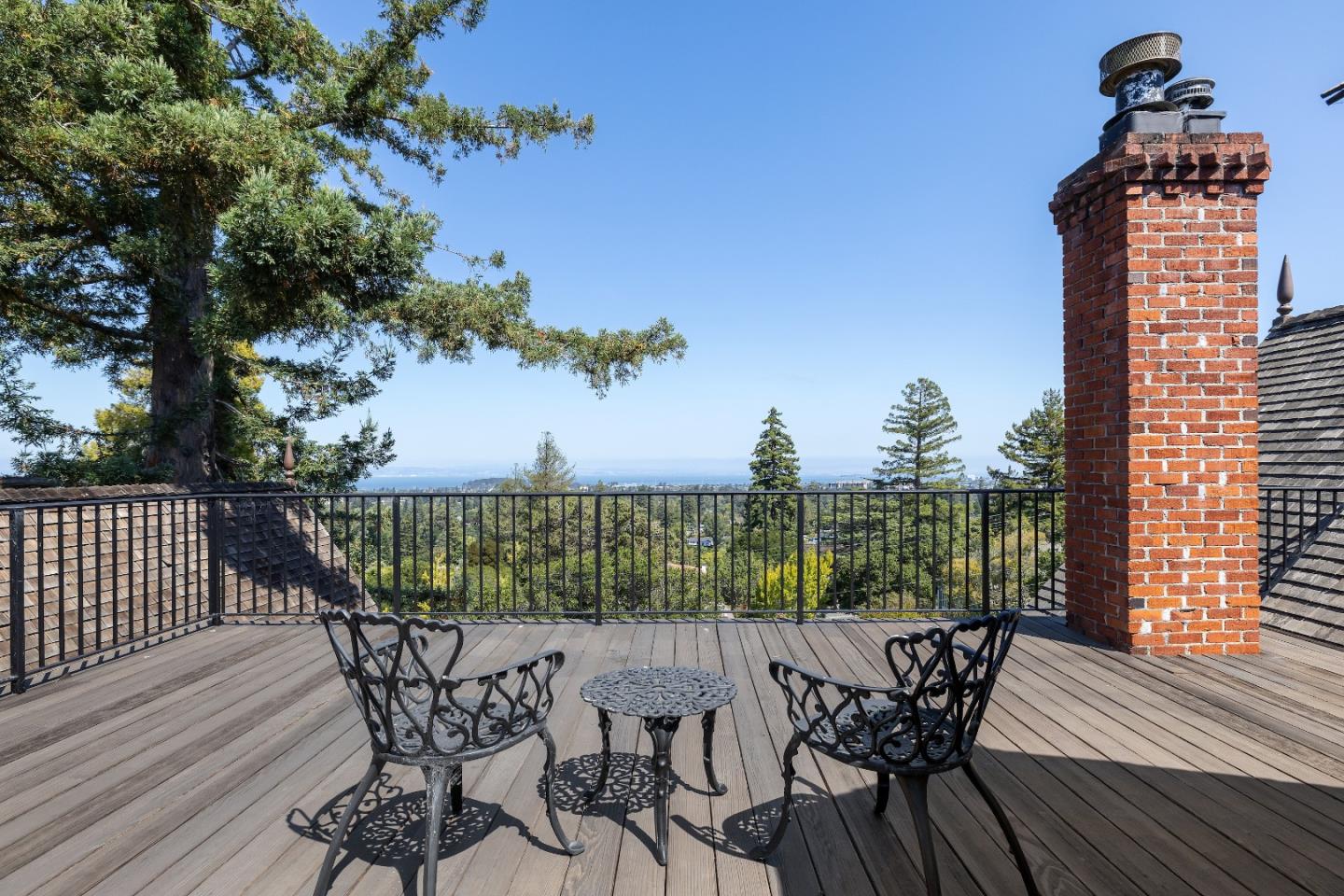 446 El Arroyo Road Hillsborough, CA 94010 - Photo 23 of 32 a view of a balcony with furniture