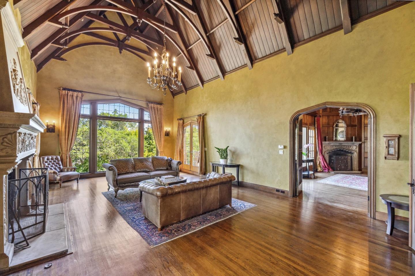 446 El Arroyo Road Hillsborough, CA 94010 - Photo 8 of 32 a living room with furniture and wooden floor