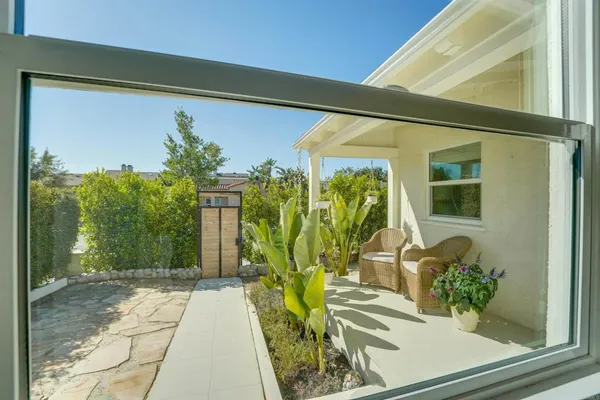 a view of a entryway door front of house
