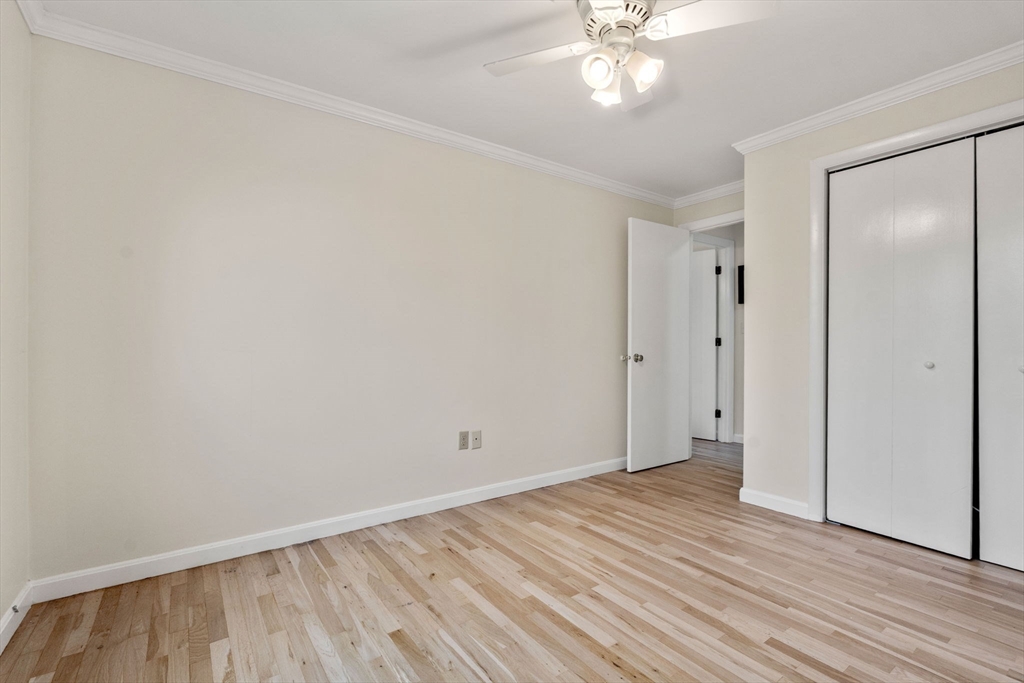 36 Dunham Road, Unit 109 Beverly, MA 01915 - Photo 18 of 22 wooden floor in an empty room