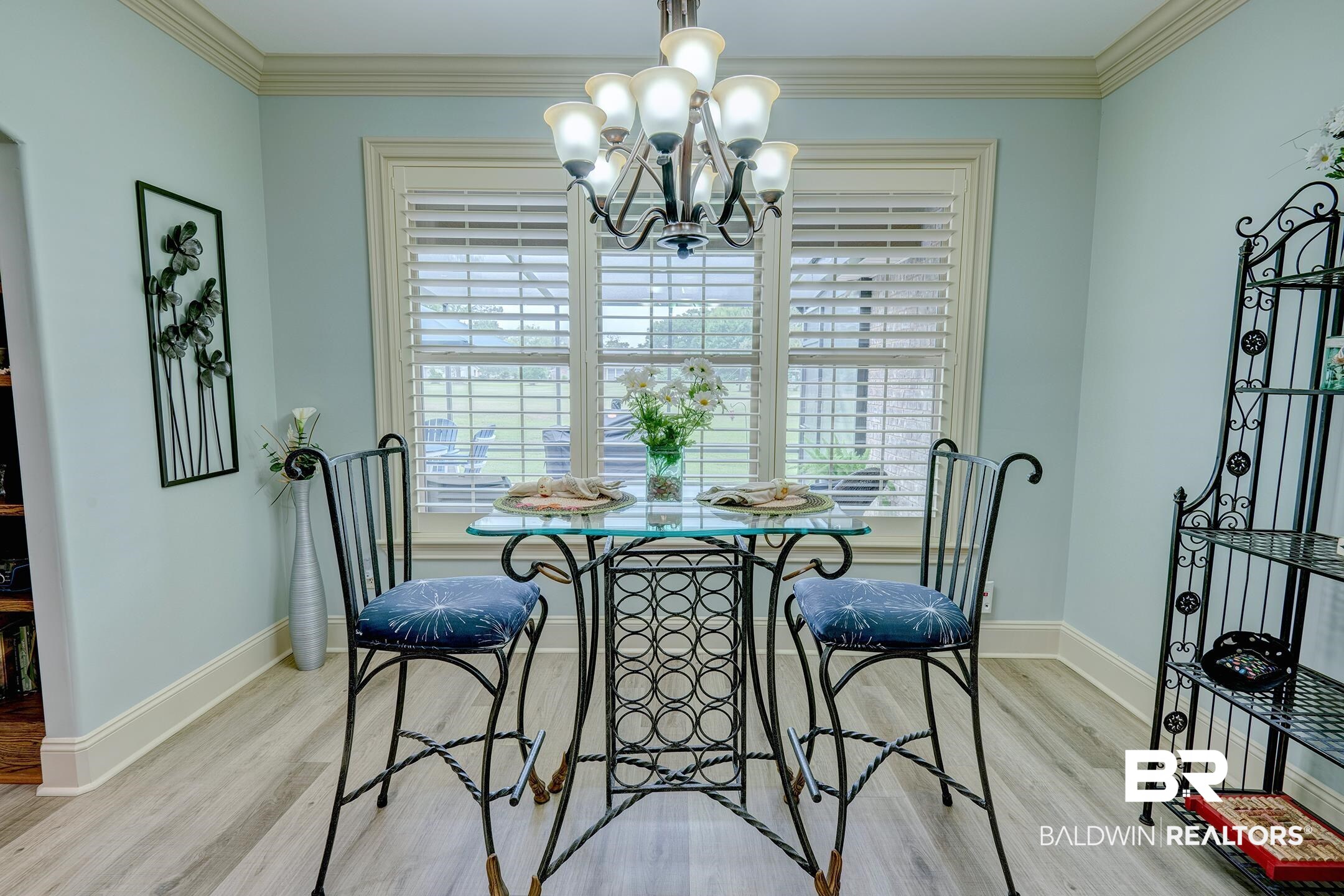 9357 Lakeview Drive Foley, AL 36535 - Photo 34 of 68 Bright interior space featuring a multi-pane window, plantation shutters, and crown molding