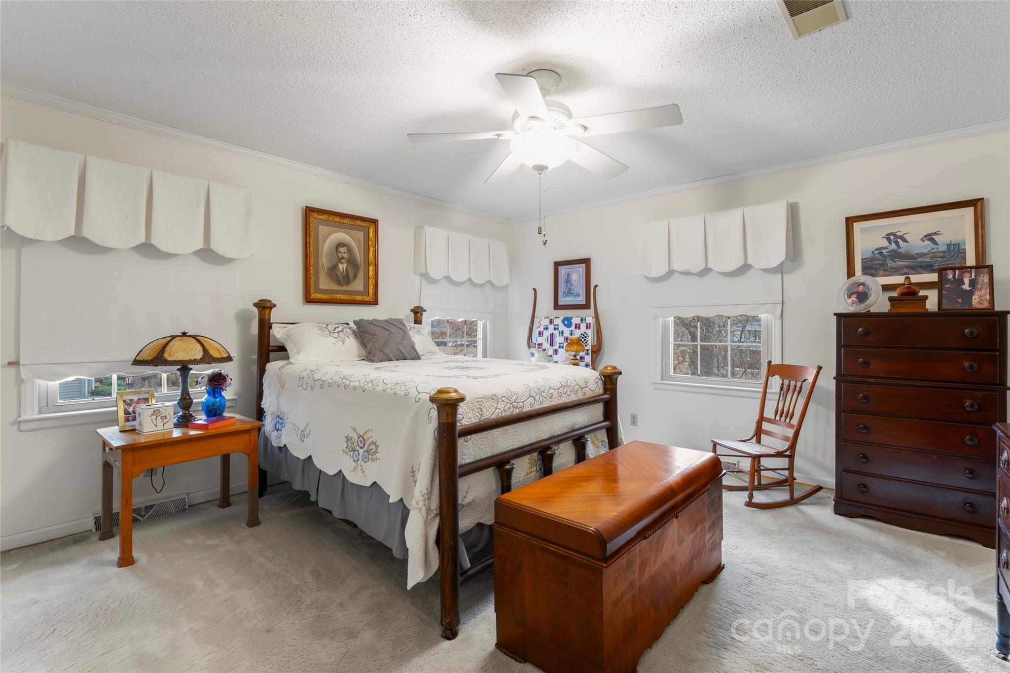 950 Arrowhead Drive Rock Hill, SC 29730 - Photo 18 of 38 a bedroom with furniture and a chandelier