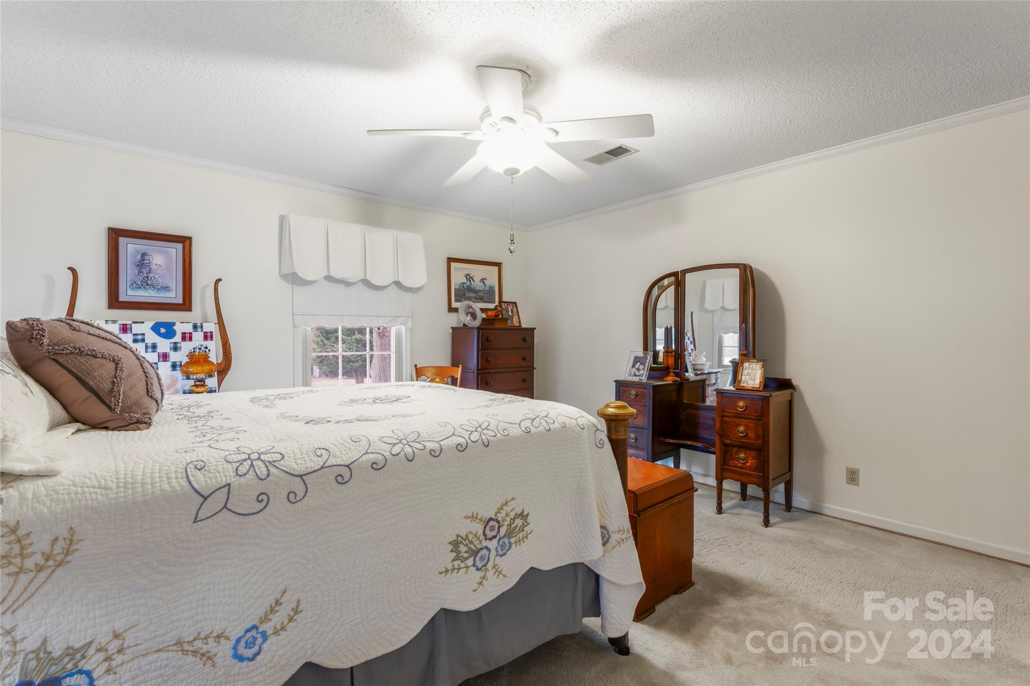 950 Arrowhead Drive Rock Hill, SC 29730 - Photo 20 of 38 a bed room with a bed and a mirror