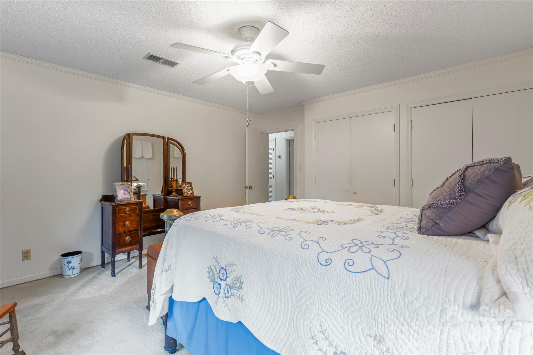 950 Arrowhead Drive Rock Hill, SC 29730 - Photo 21 of 38 a bedroom with a large bed and a chandelier