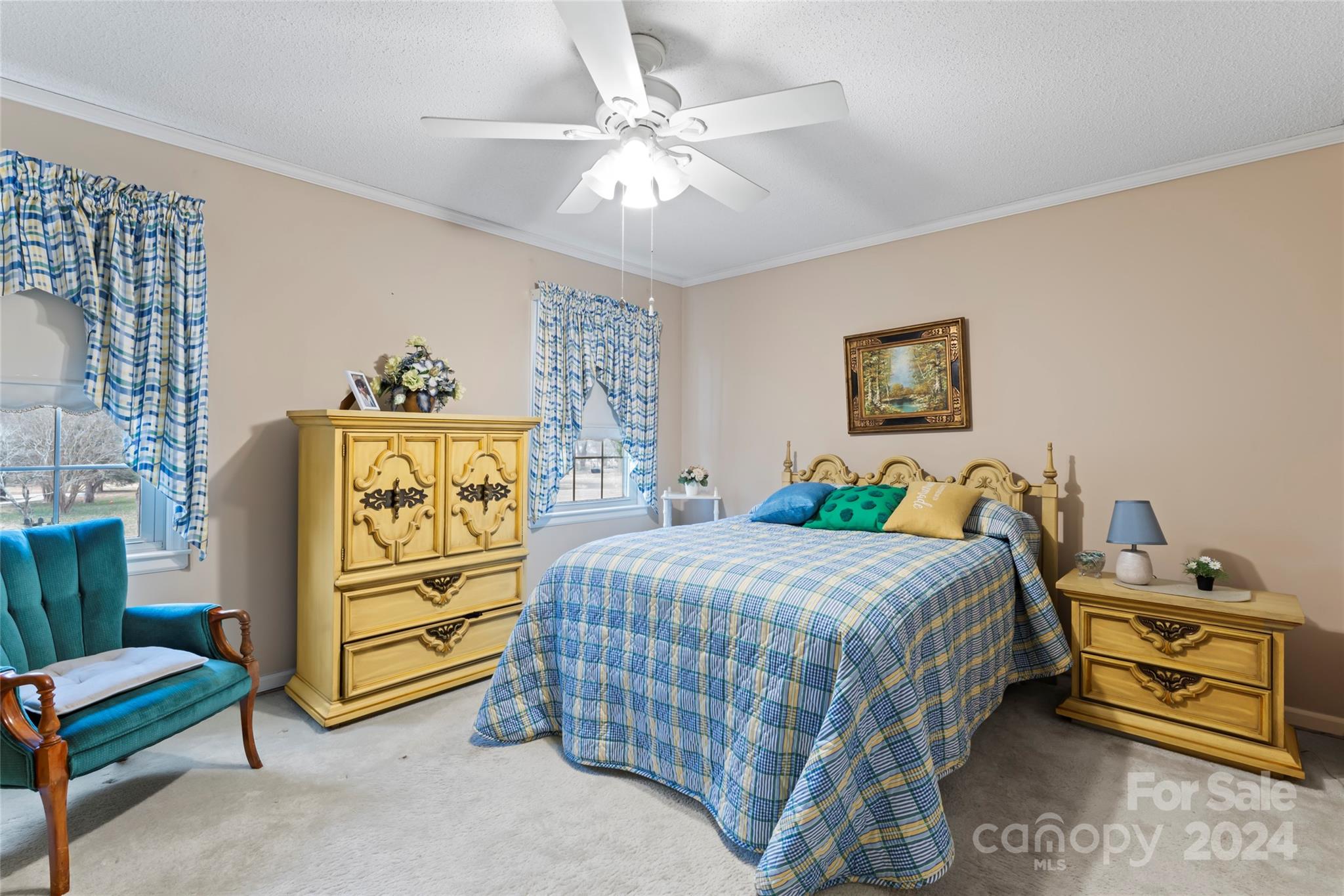 950 Arrowhead Drive Rock Hill, SC 29730 - Photo 24 of 38 a bedroom with a bed and a chandelier