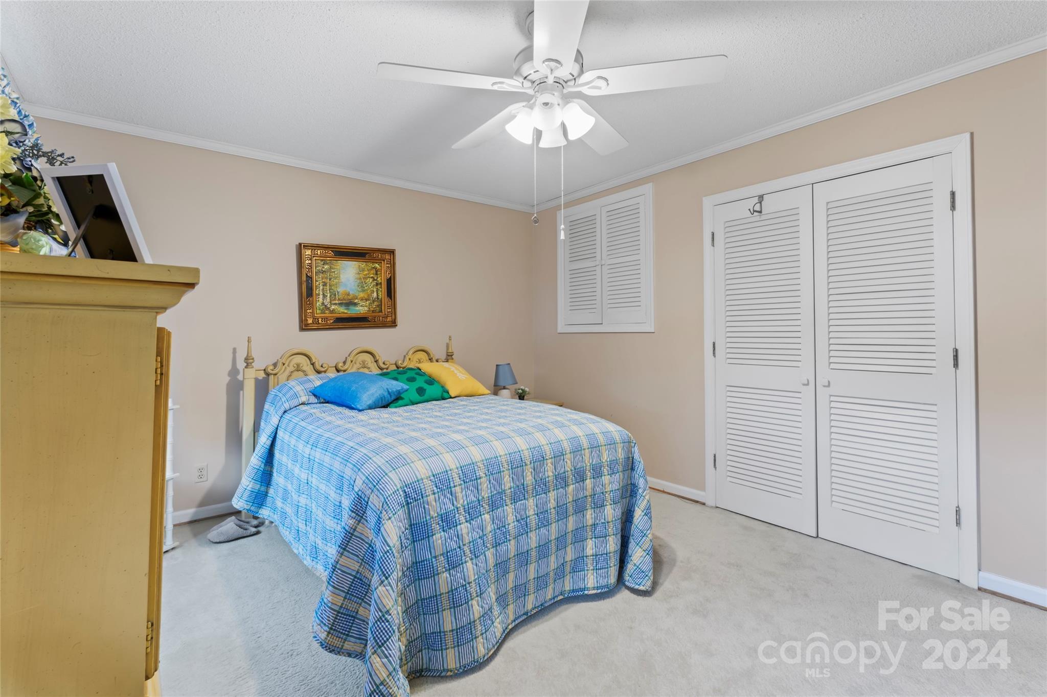 950 Arrowhead Drive Rock Hill, SC 29730 - Photo 25 of 38 a bedroom with a bed and a chandelier