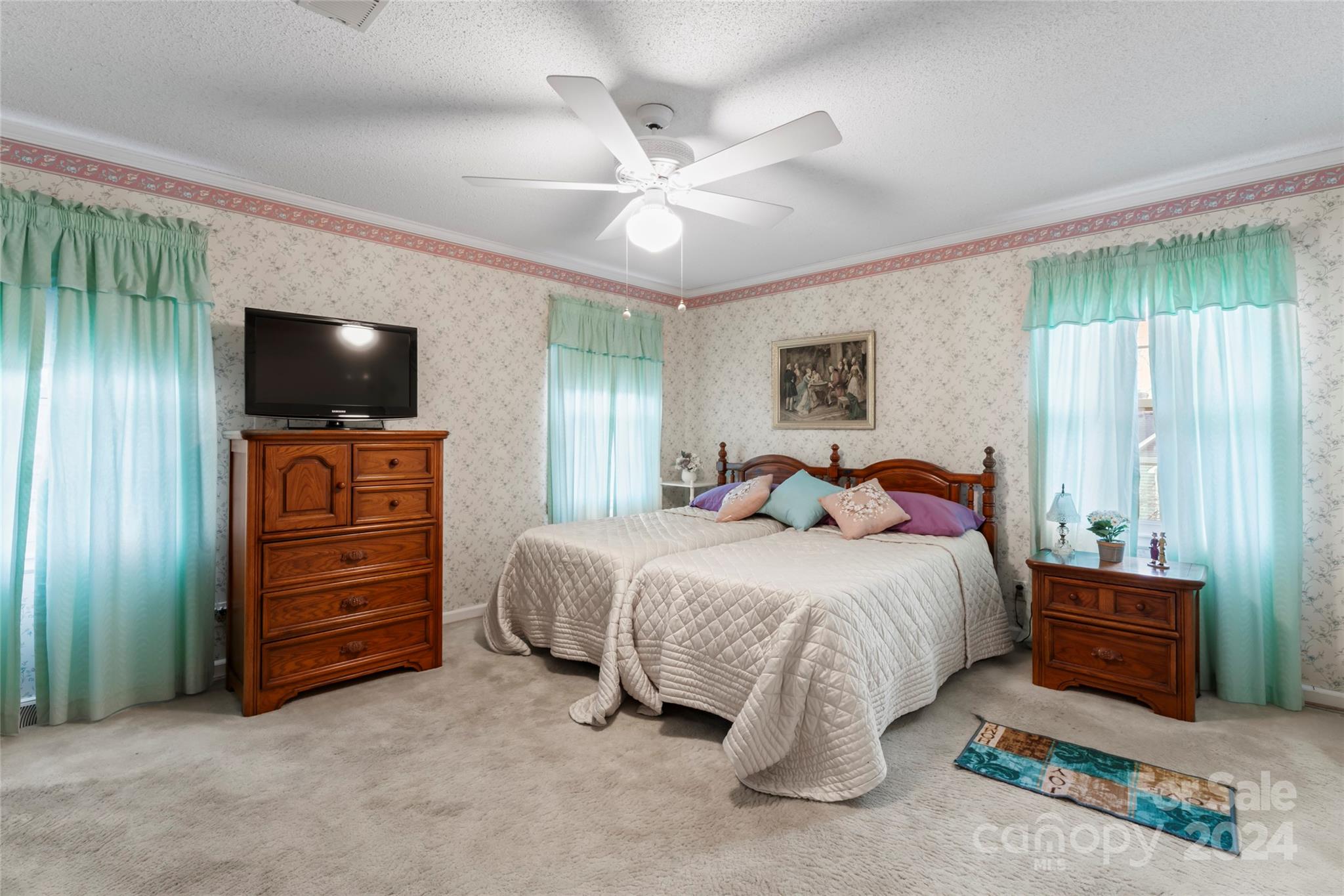 950 Arrowhead Drive Rock Hill, SC 29730 - Photo 29 of 38 a spacious bedroom with a bed and a flat screen tv