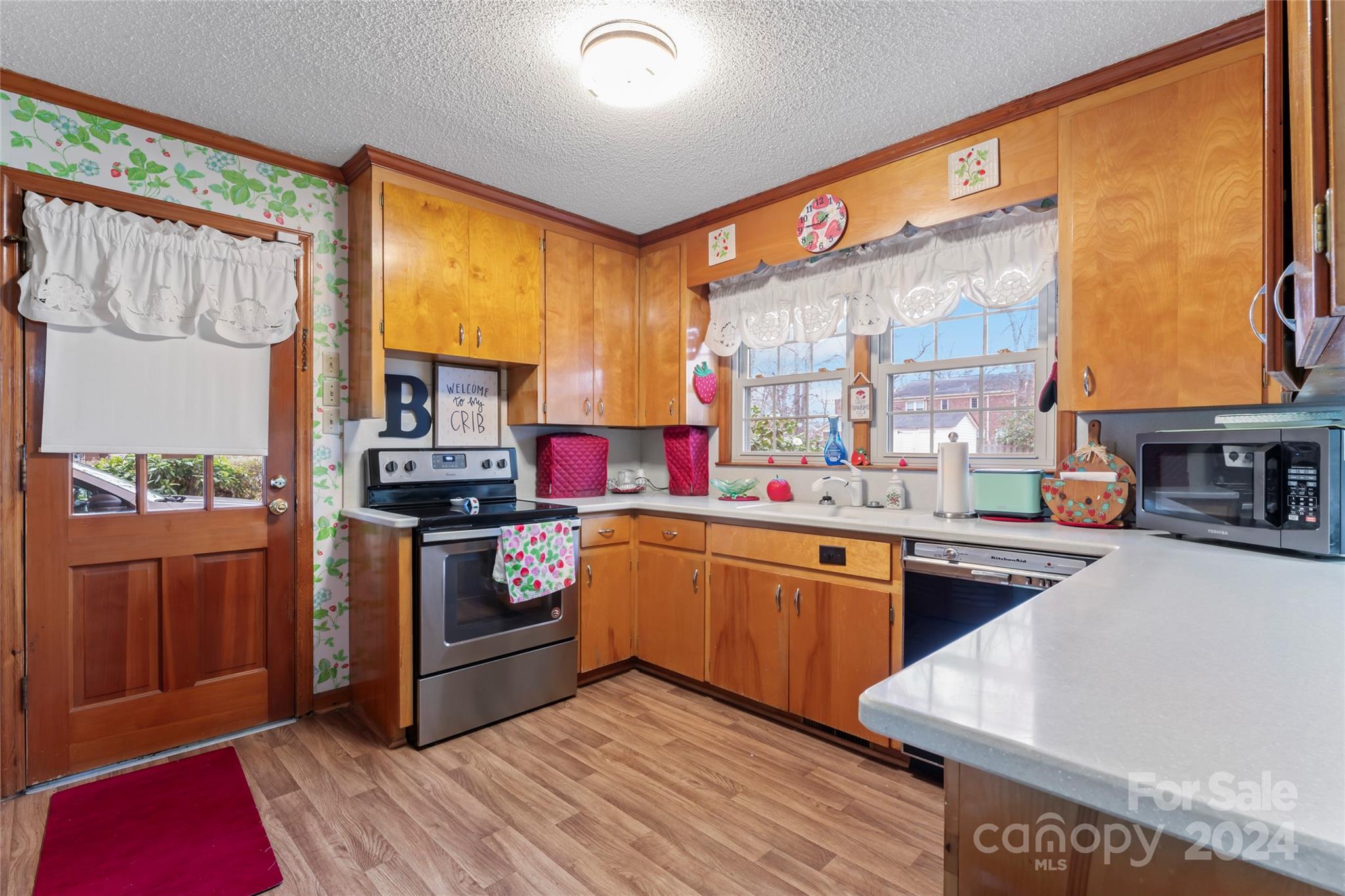 950 Arrowhead Drive Rock Hill, SC 29730 - Photo 3 of 38 a kitchen with stainless steel appliances granite countertop a stove a sink dishwasher and a refrigerator