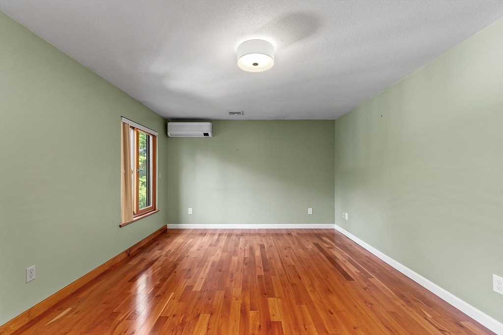 18 Lancaster Crossing Road Salem, NH 03079 - Photo 21 of 31 a view of a room with wooden floor and windows