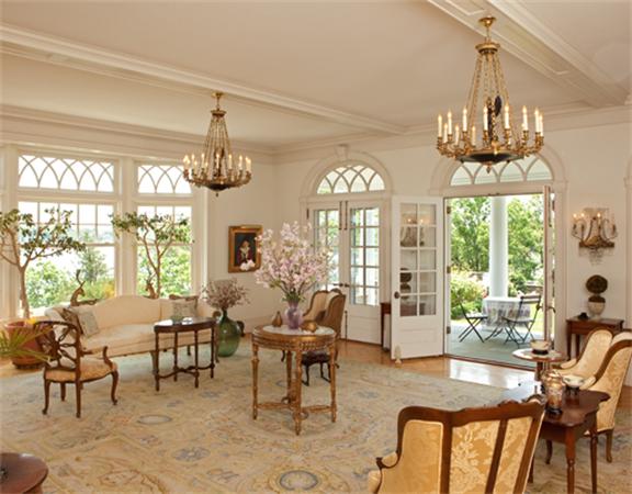 63 Nichols Road Cohasset, MA 02025 - Photo 7 of 22 a view of a dining room with furniture wooden floor and chandelier