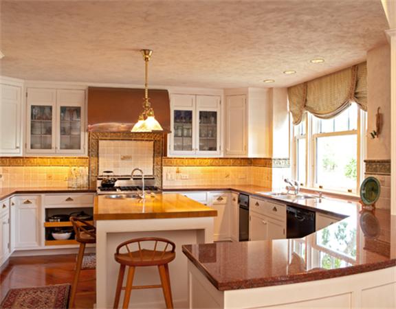 63 Nichols Road Cohasset, MA 02025 - Photo 9 of 22 a kitchen with a sink stove and cabinets