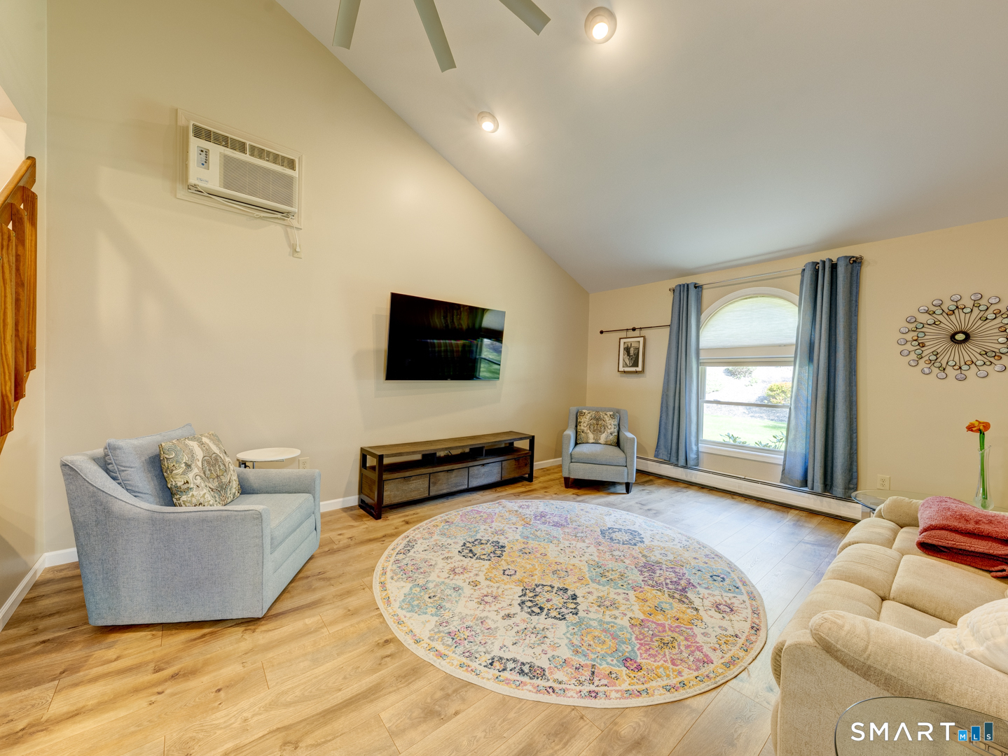 97 Lair Road New Hartford, CT 06057 - Photo 23 of 39 a living room with furniture and a flat screen tv