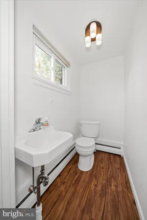 a bathroom with a sink and a toilet