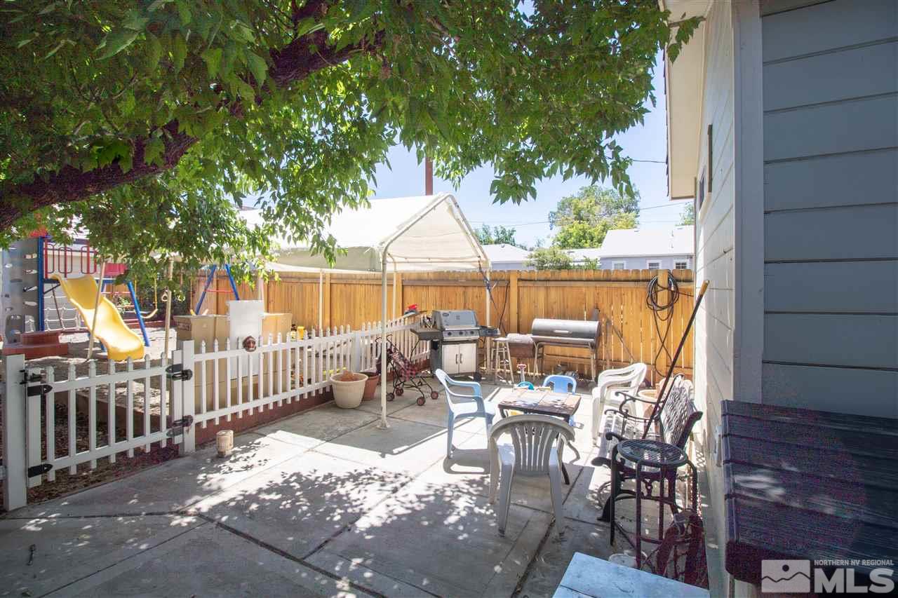 520 Claremont Street Reno, NV 89502 - Photo 15 of 22 a view of a patio with couches table and chairs and potted plants