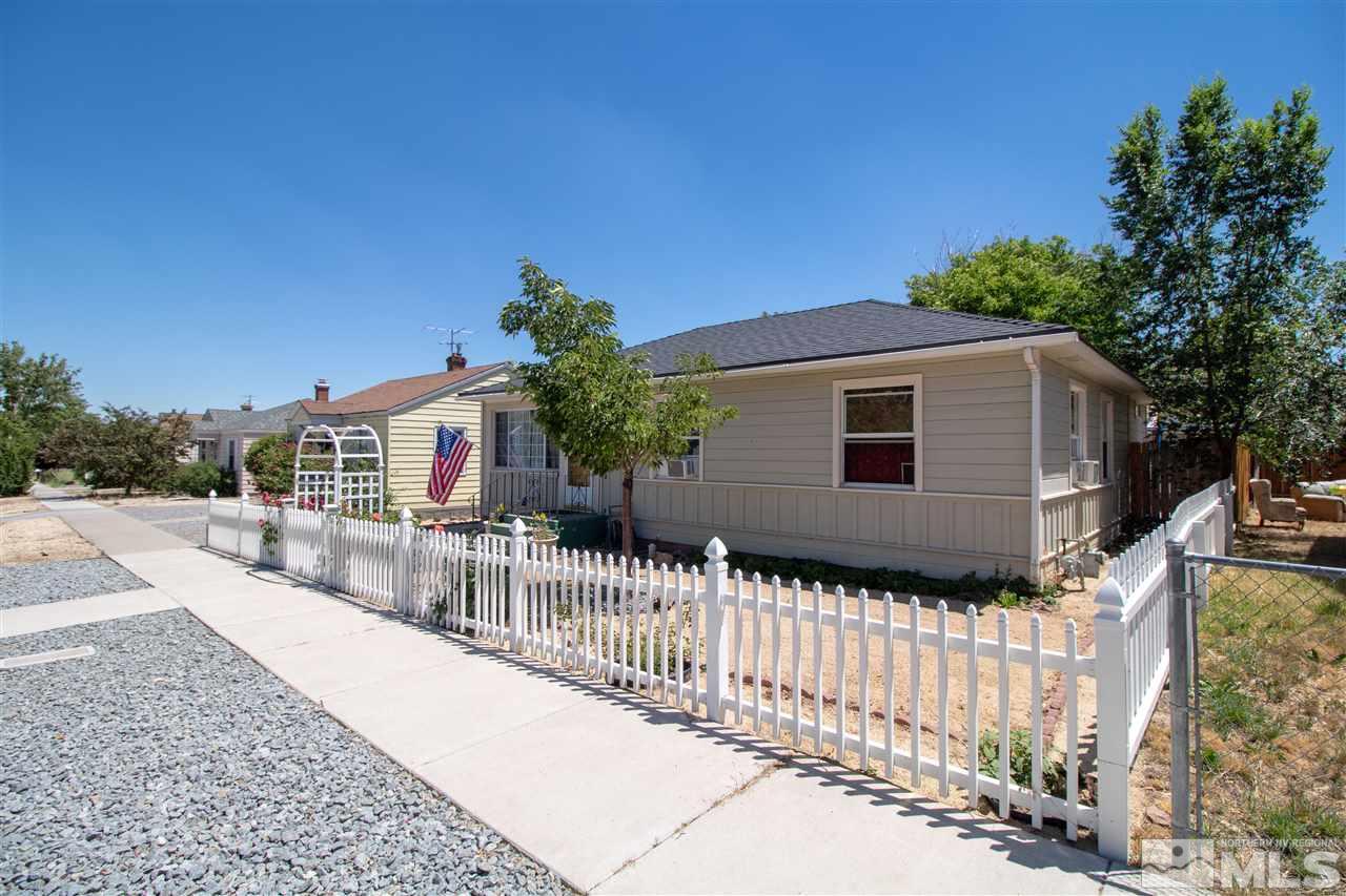 520 Claremont Street Reno, NV 89502 - Photo 2 of 22 a front view of a house with a yard