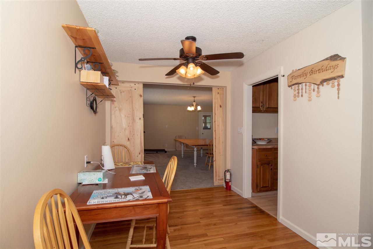 520 Claremont Street Reno, NV 89502 - Photo 5 of 22 a dining room with a table and chairs