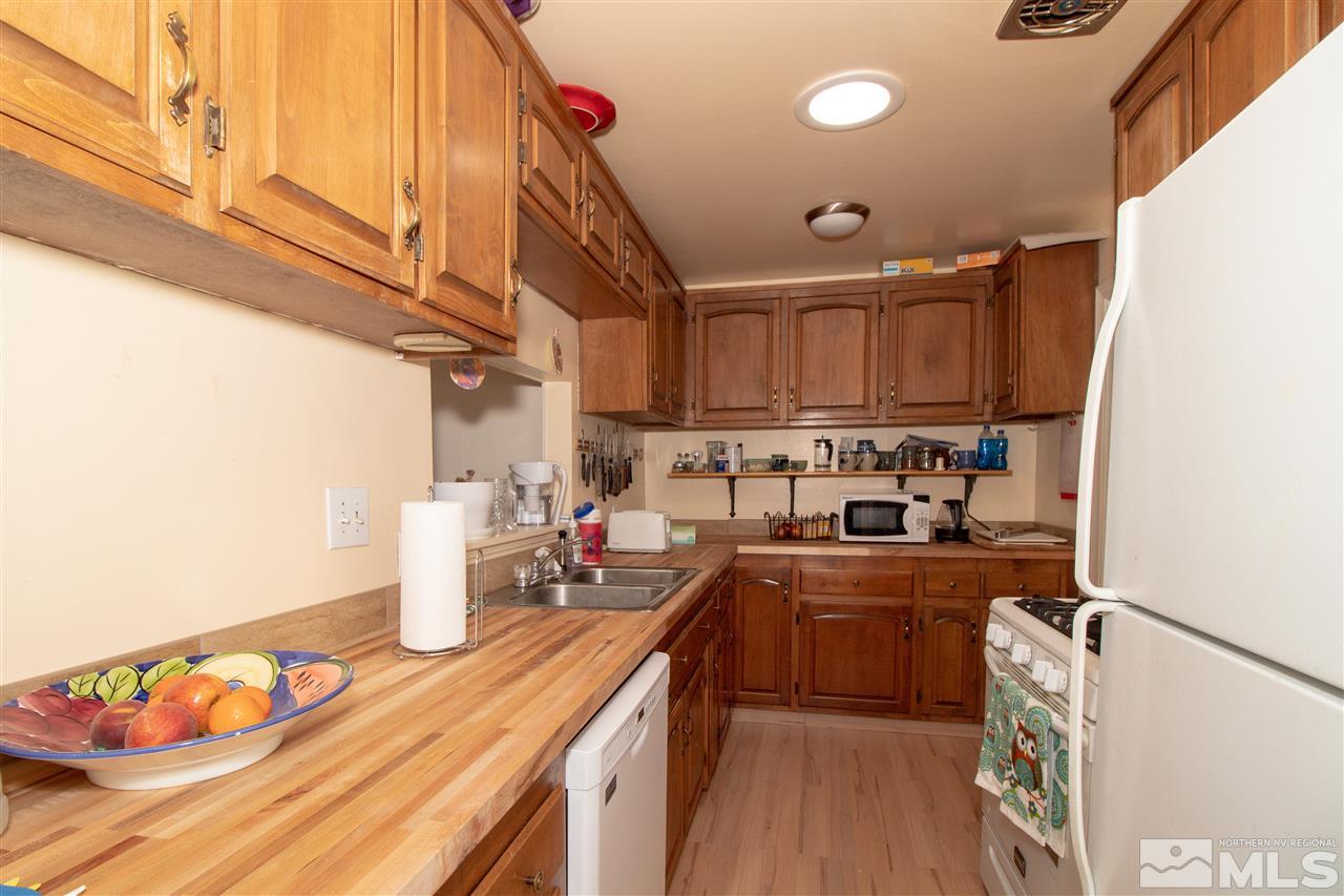 520 Claremont Street Reno, NV 89502 - Photo 9 of 22 a kitchen with lots of counter top space and cabinets