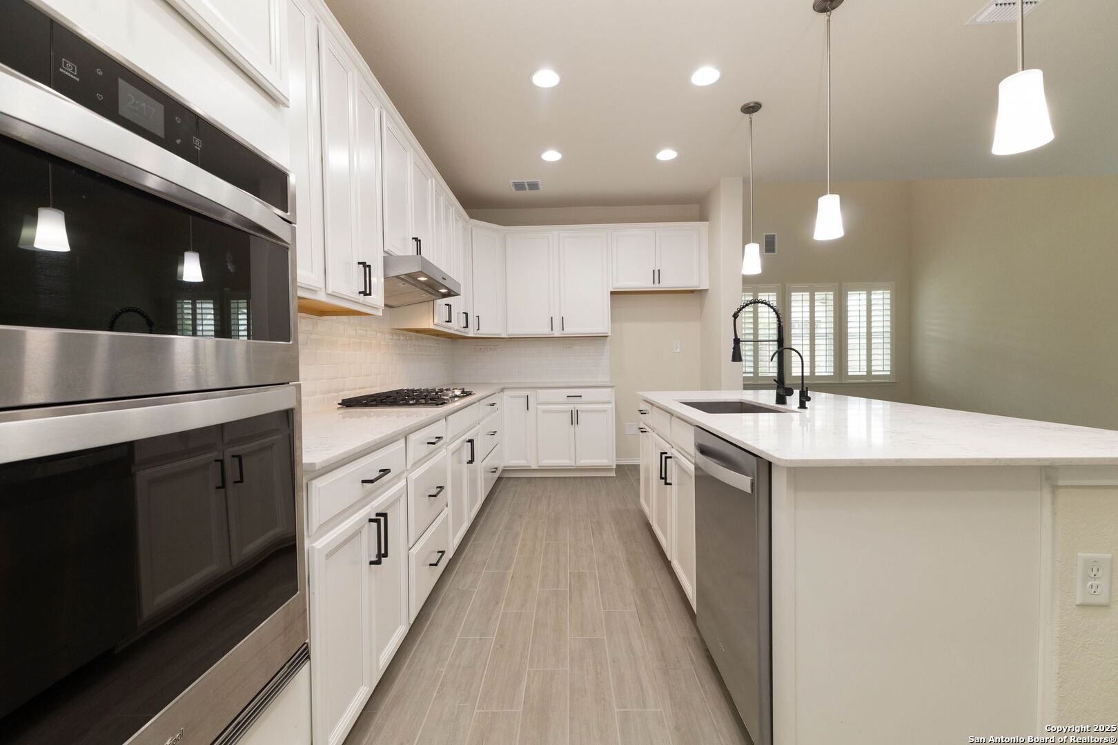 353 Aberdeen Boerne, TX 78015 - Photo 15 of 36 a kitchen with cabinets and sink