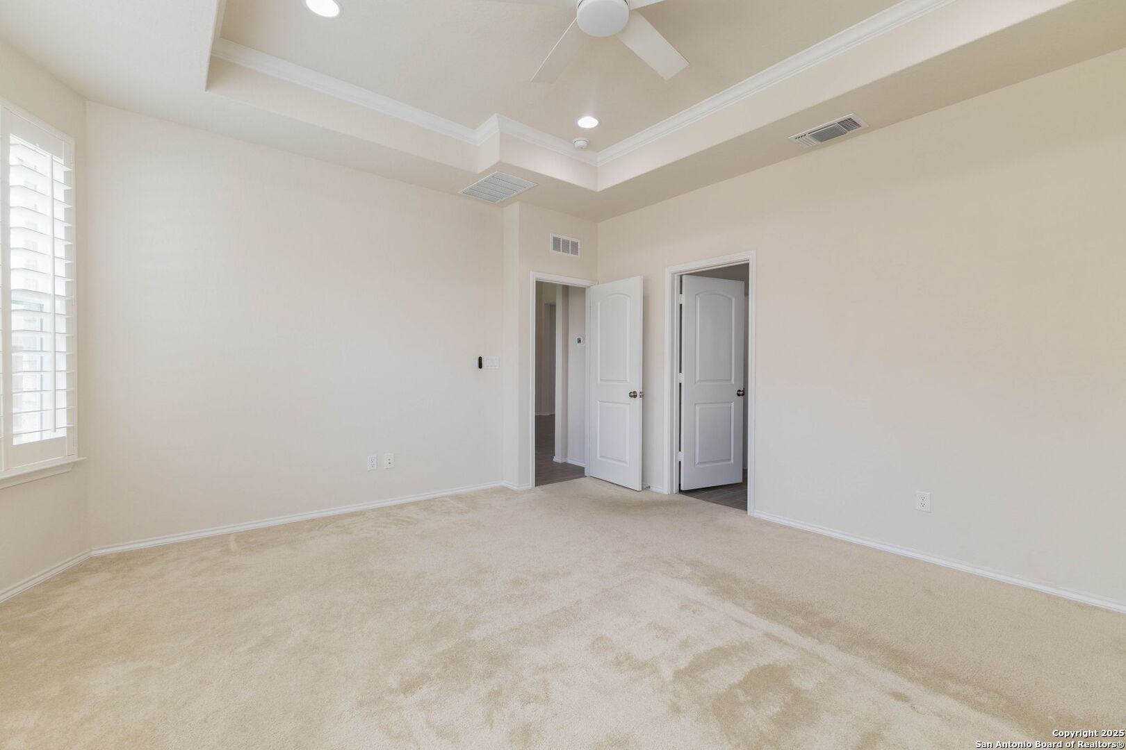 353 Aberdeen Boerne, TX 78015 - Photo 17 of 36 an empty room with windows and closet