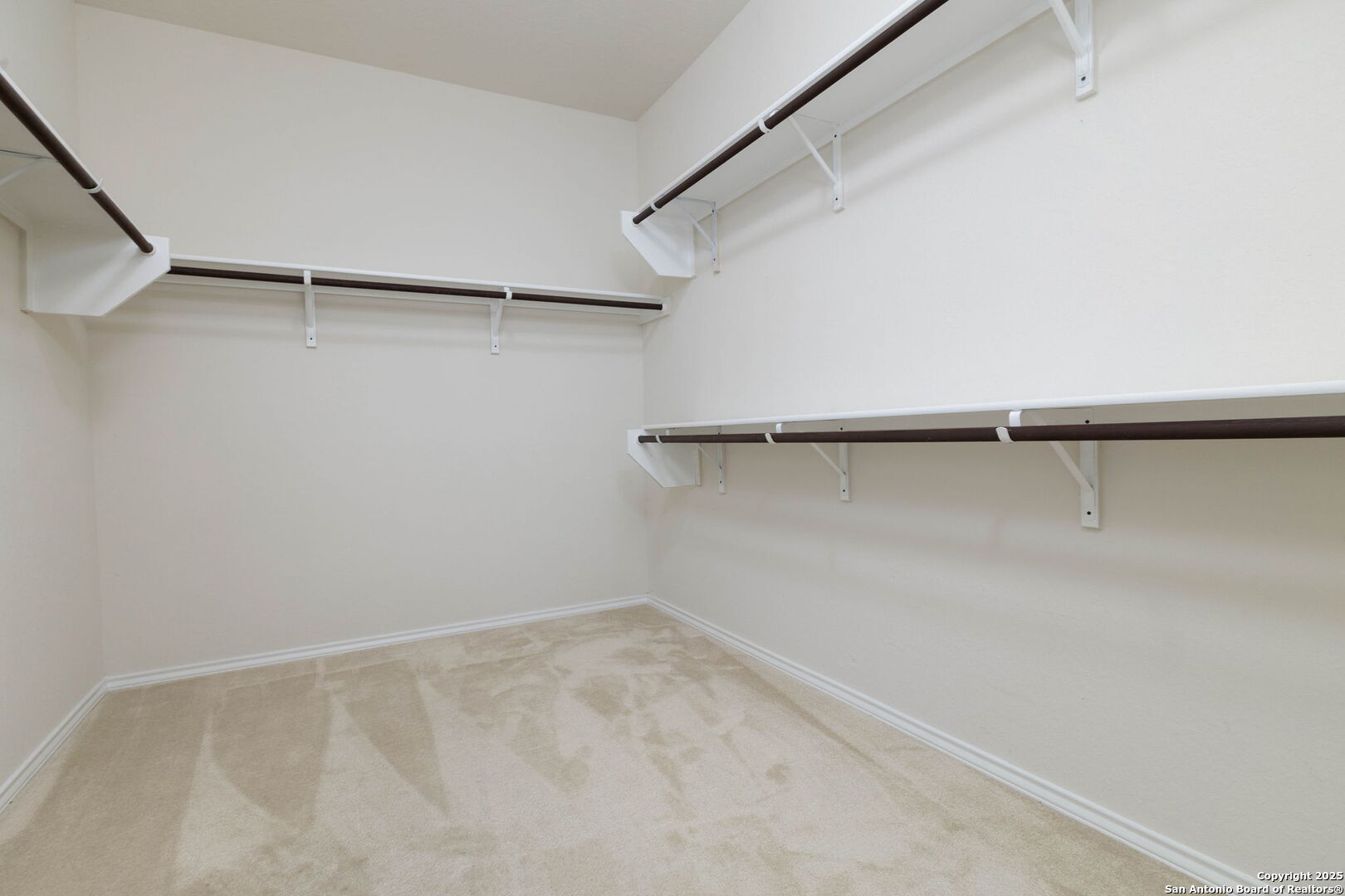 353 Aberdeen Boerne, TX 78015 - Photo 20 of 36 a view of a room with racks on the wall