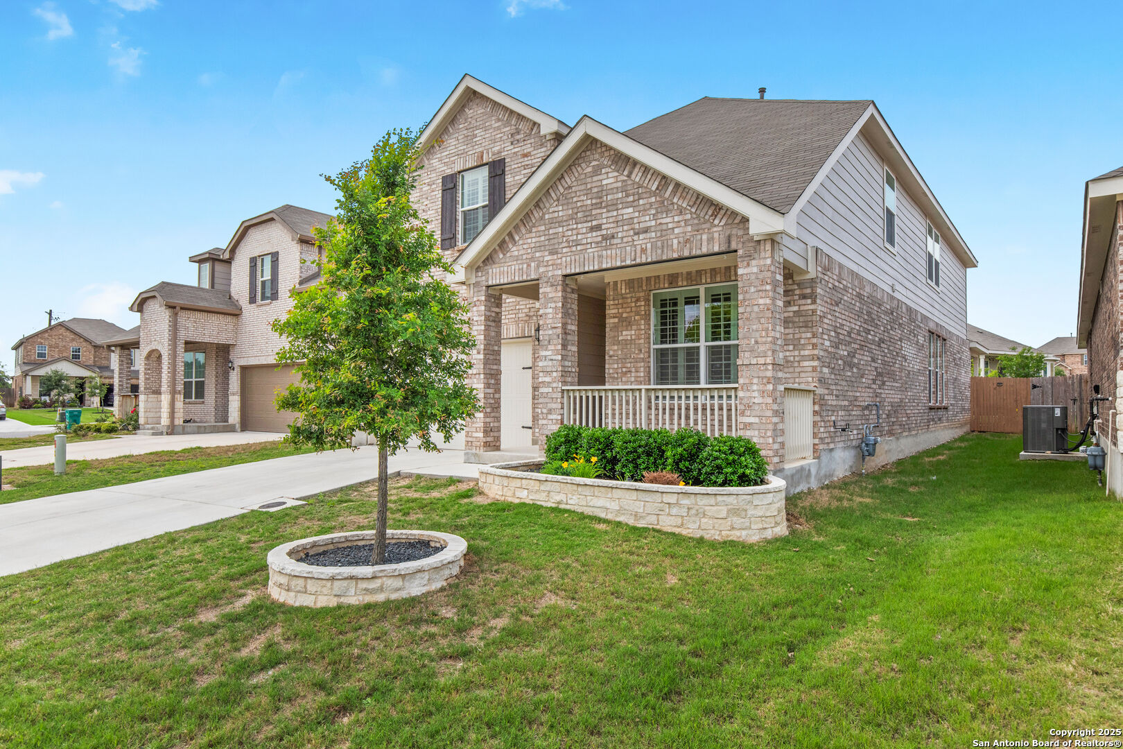 353 Aberdeen Boerne, TX 78015 - Photo 2 of 36 a front view of a house with a yard